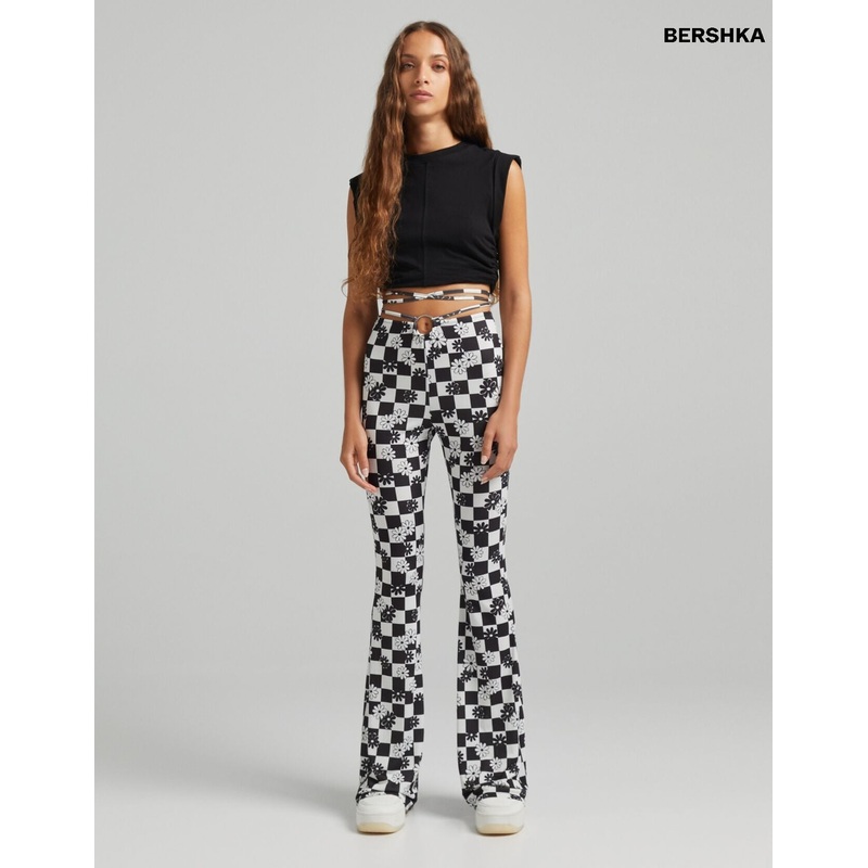 Bershka Printed flare trousers with ring detail 5119/188/060